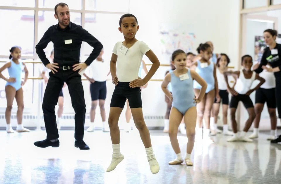 Citydance program manager Yo-el Cassell with students José Garcia and Madeline Romero.(ARAM BOGHOSIAN FOR THE BOSTON GLOBE)