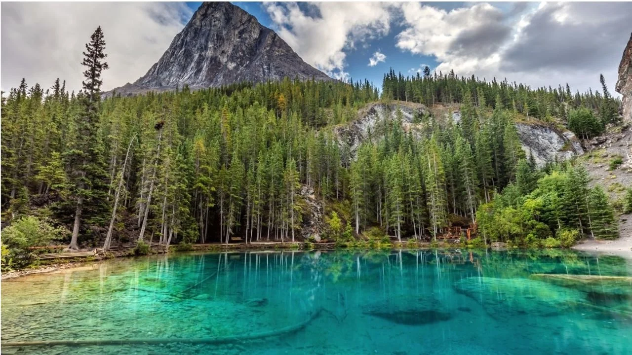 Grassi Lakes in Kananaskis near Canmore Alberta with turquoise water and mountain backdrop.