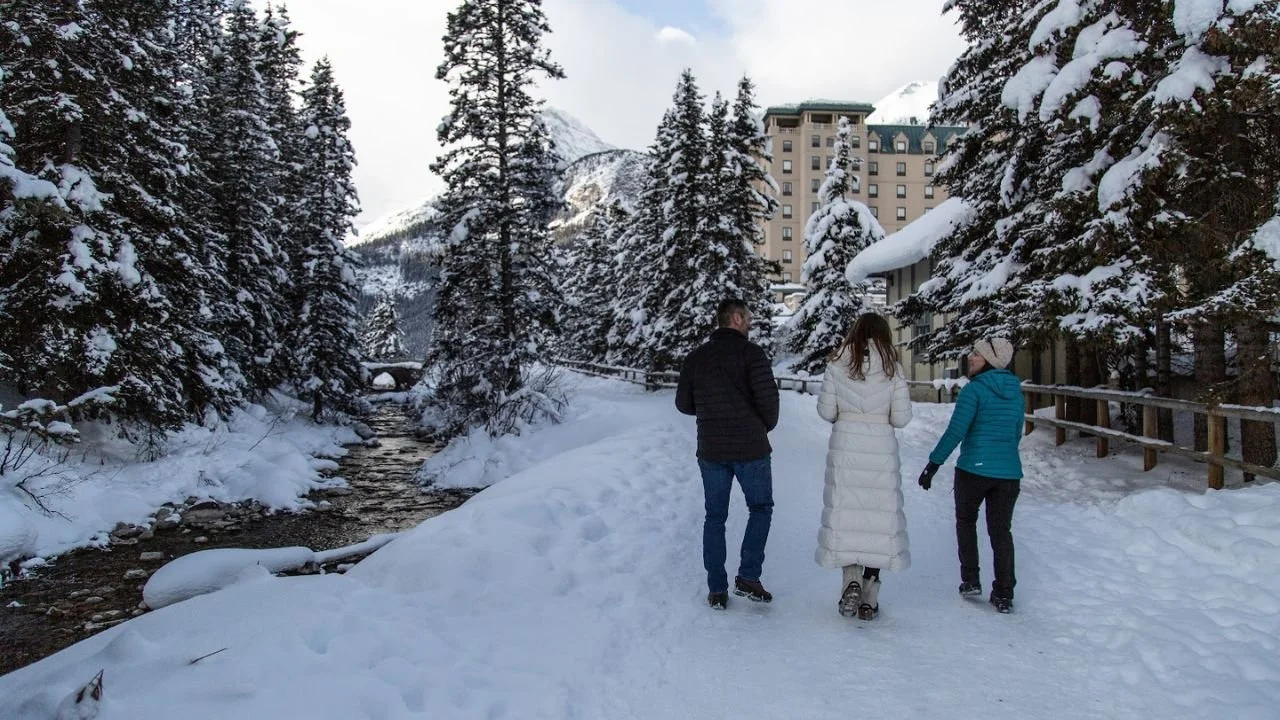 Winter walk along a snowy path from Canmore to Banff. 