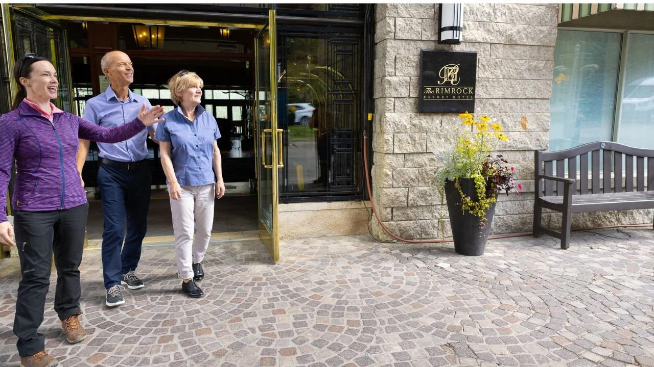 Visitors outside a hotel in Banff, Canada.