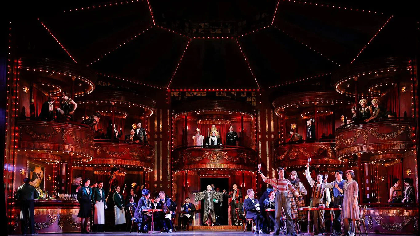 centre to right: Jane Ede (Musetta), Christopher Tonkin (Marcello), Richard Anderson (Colline), Christopher Hillier (Schaunard), Yosep Kang (Rodolfo), Maija Kovalevska (Mimi)
