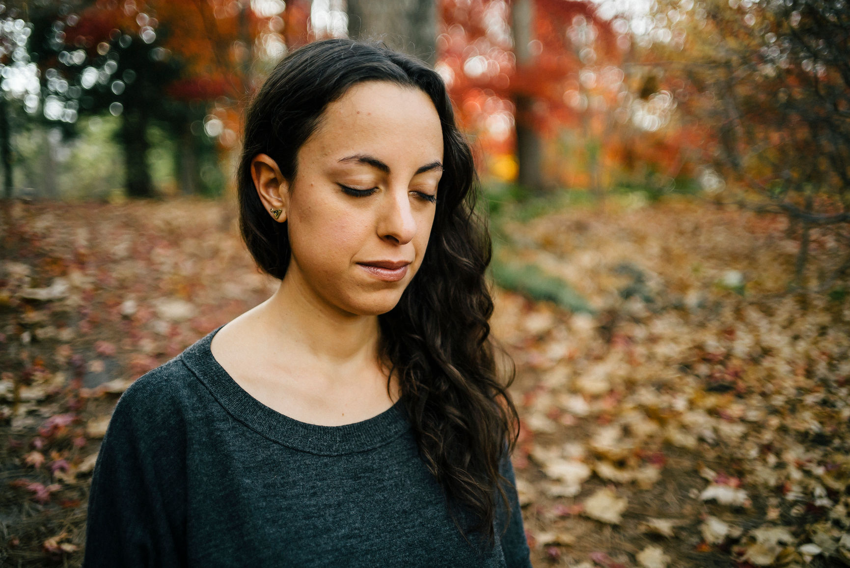 Integrative Medicine Specialist, Richmond, VA, an image of a woman walking in the woods during fall.jpg