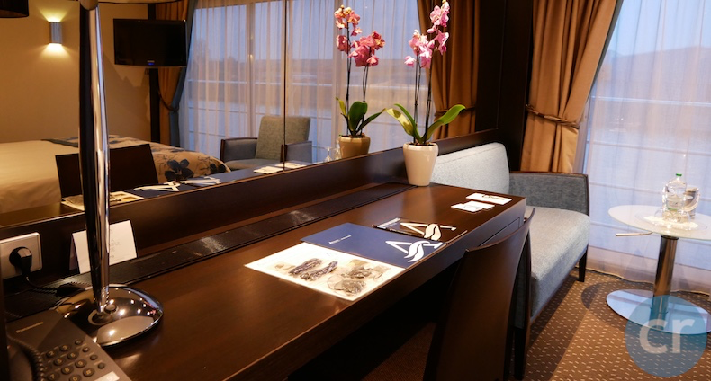 Desk and sofa in stateroom