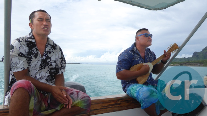 Rai and Ari'i sing Polynesian songs as we sail through the waters surrounding Bora Bora