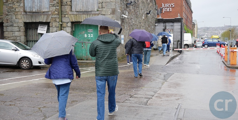 Tauck guests with umbrellas in Cork Ireland.png