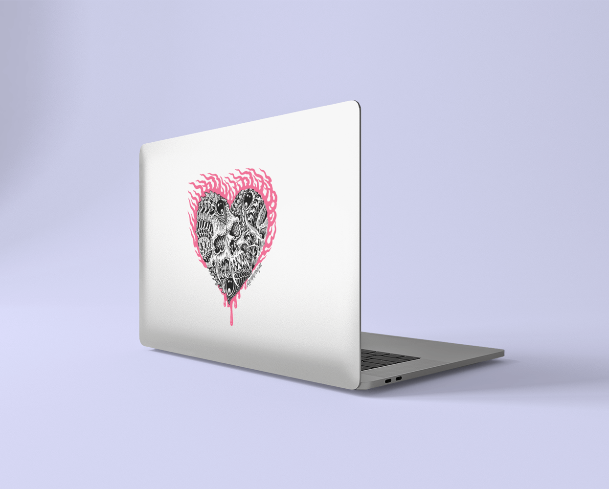 John Reardon horror pink and black biomech dye-cut sticker on laptop in front of a lilac background