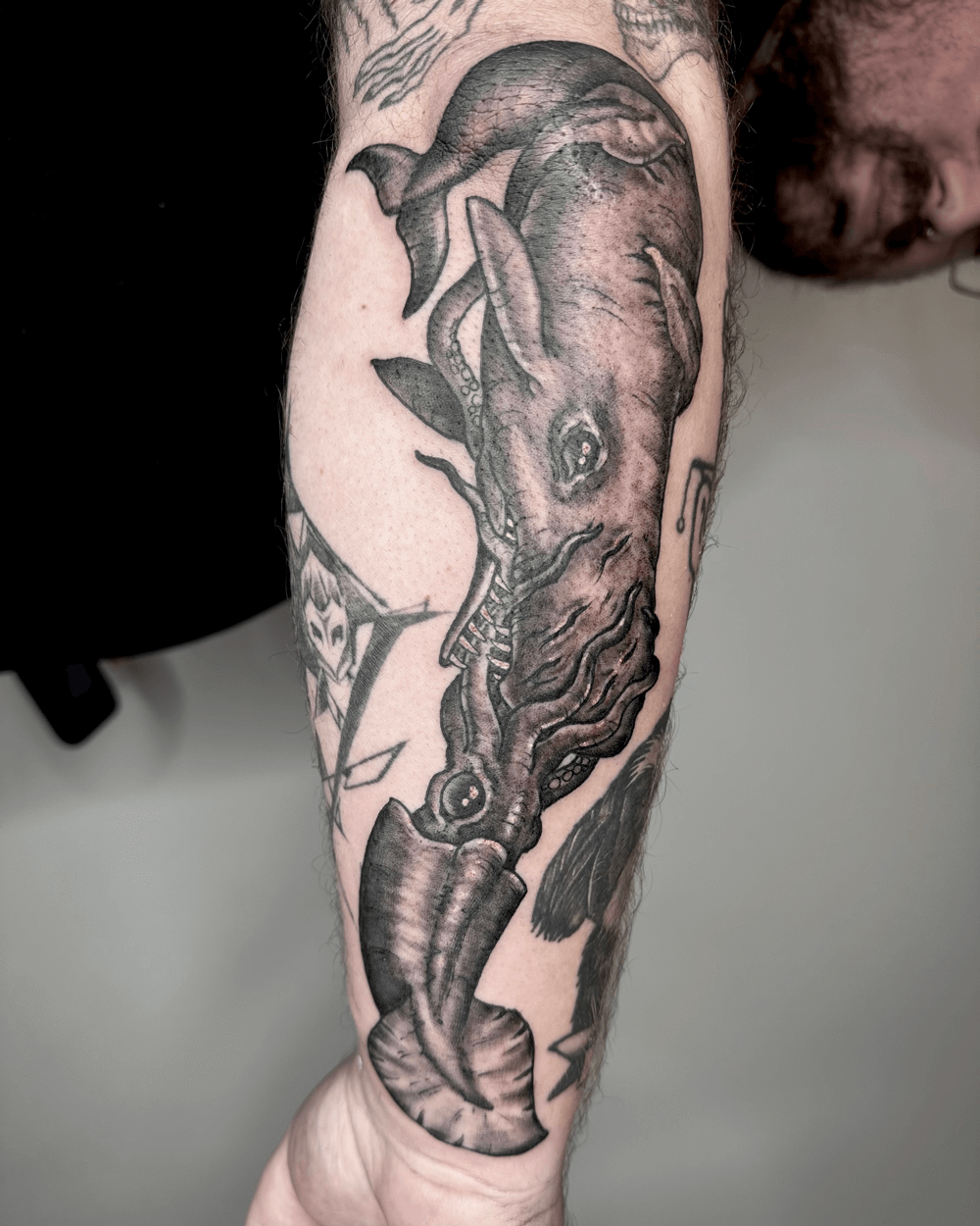 Whale-and-squid-tattoo-on-arm-black-grey.png
