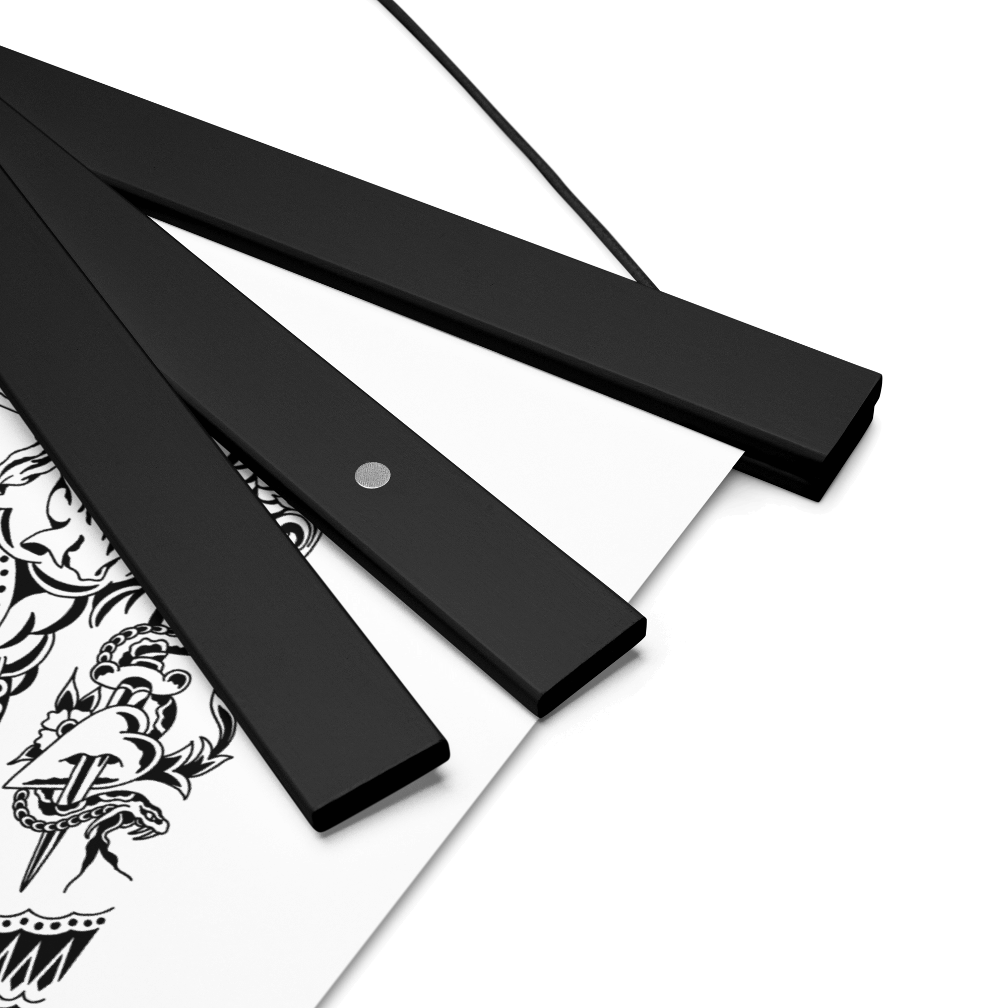 Close up of black magnetic frame strips.