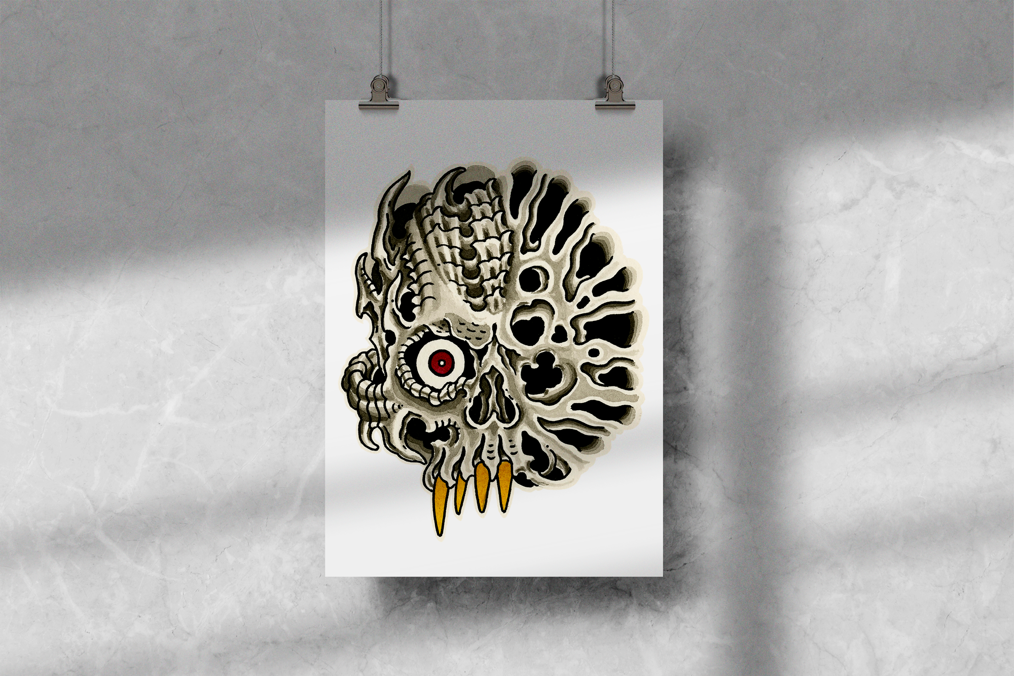 Color Skull print hanging on string and clips in front of concreate grey wall.