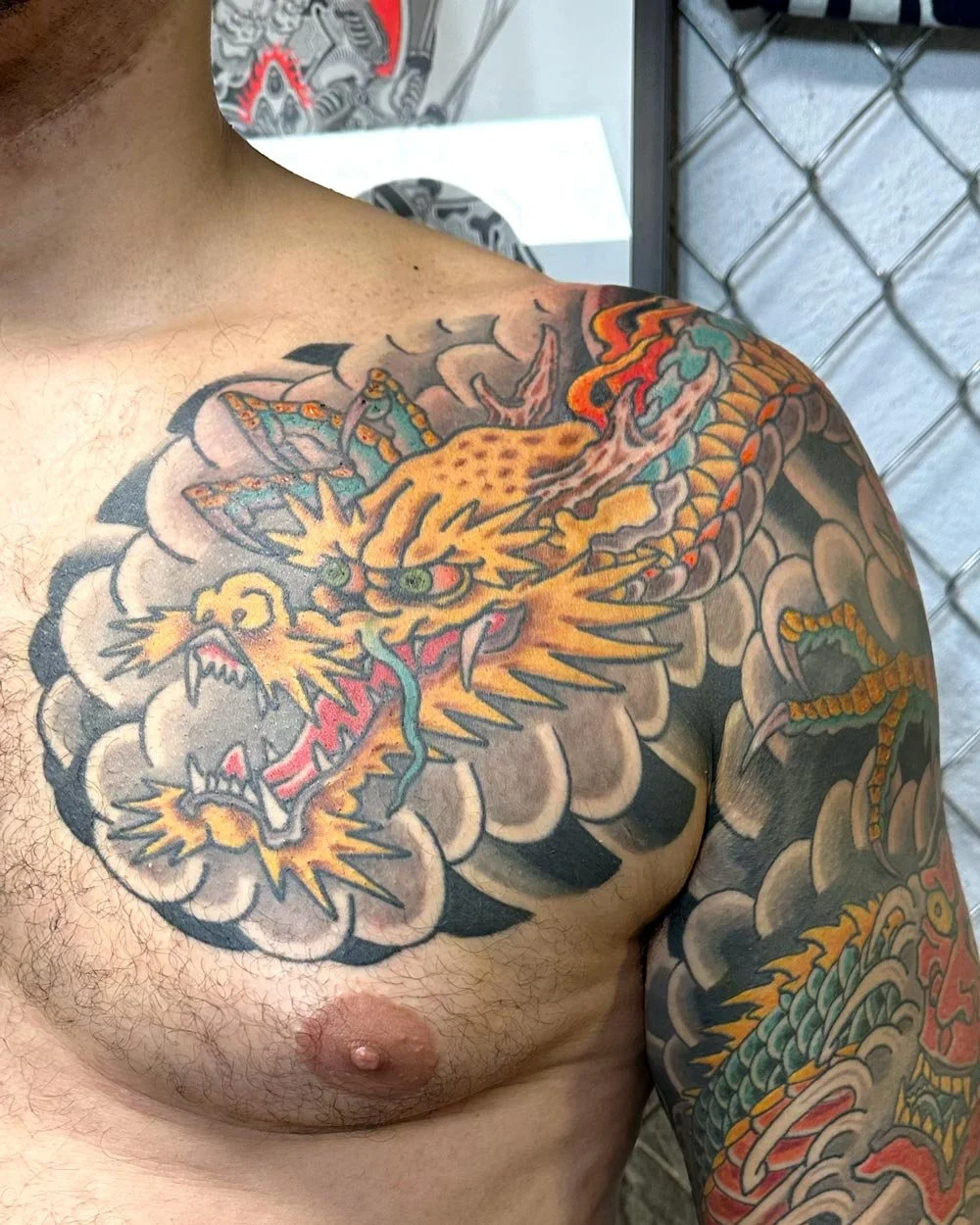 Color-dragon-tattoo-on-chest-close-up-of-a-japanese-color-sleeve-from-nyc.jpg