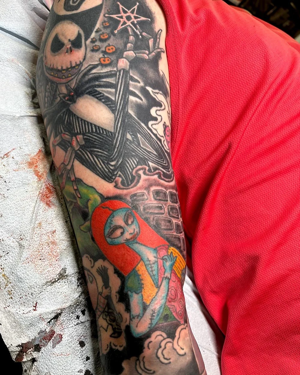Tim Burton tattoo sleeve in color by NYC tattooer John Reardon.