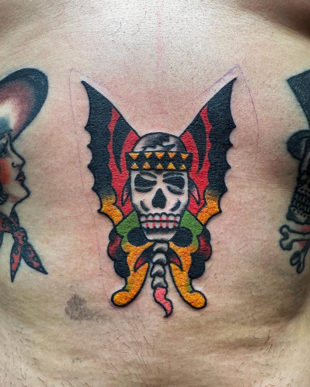 Color tattoo by John Reardon of a Jason Ochoa traditional design.