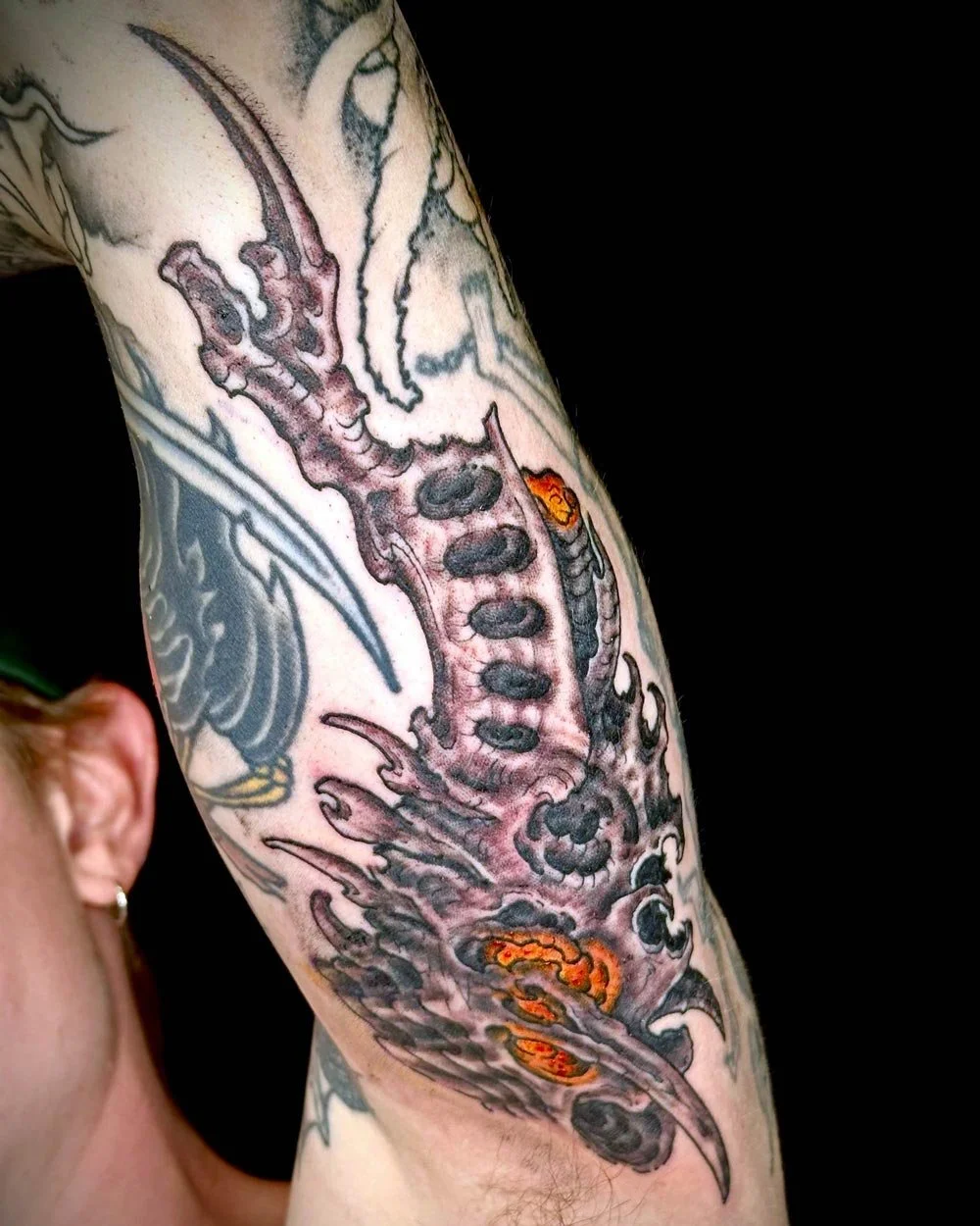 Drawn-on tattoo of a biomech skull by John Reardon done Upstate NY.