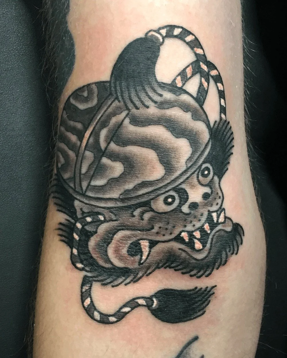 Black and grey tattoo of a traditional Japanese-demon-tattooed in New York by John Reardon.