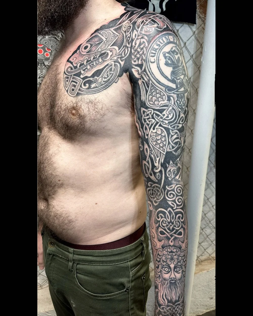Custom celtic sleeve black and grey tattoo by John Reardon.