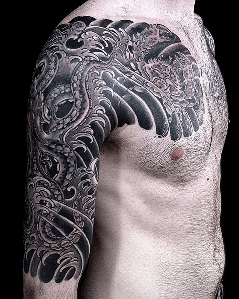 3-4 Japanese black and grey sleeve tattooed by John Reardon.