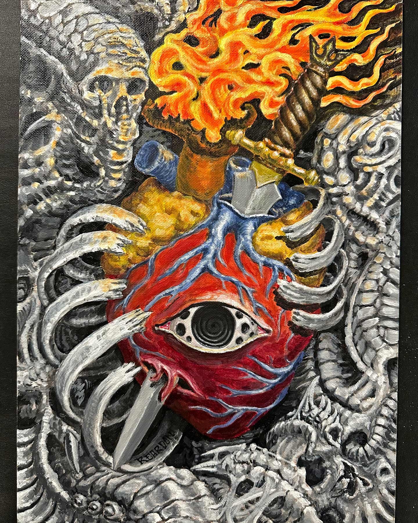 Flaming heart with eye and sword with black and grey biomech.