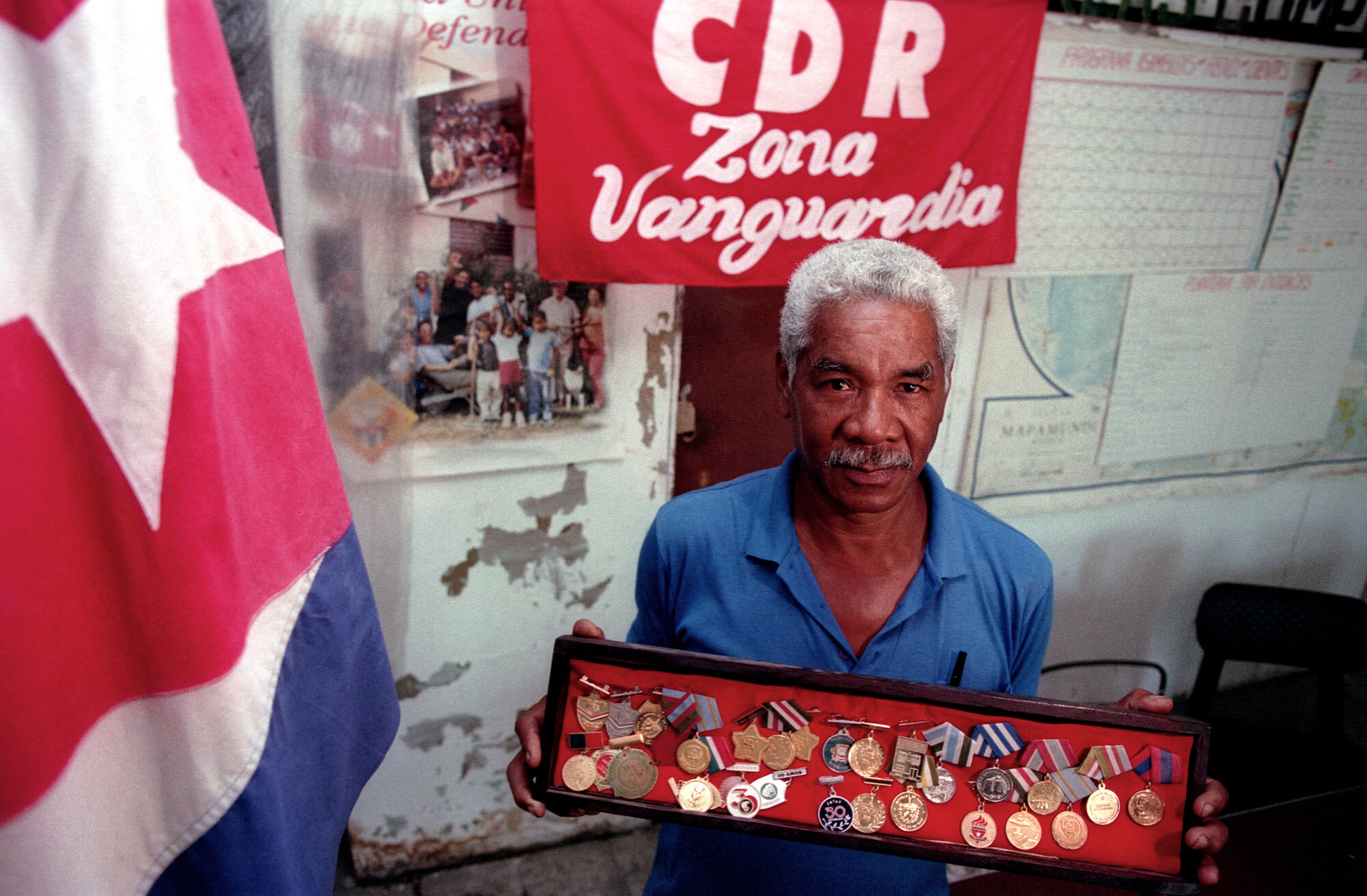  Victor Ricardo Cairo, head of a local CDR, with condecoratioons he received, 1999. 