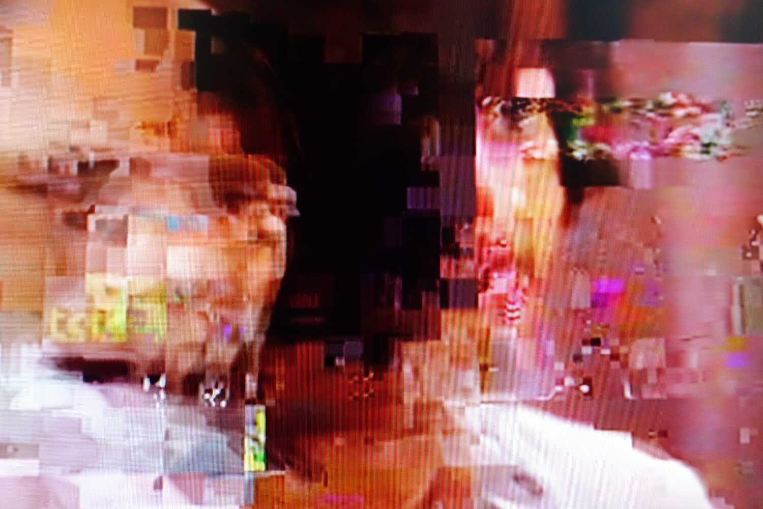  Pixelated images of a digital tv during heavy rains and thunderstorm, with bad TV signal. 