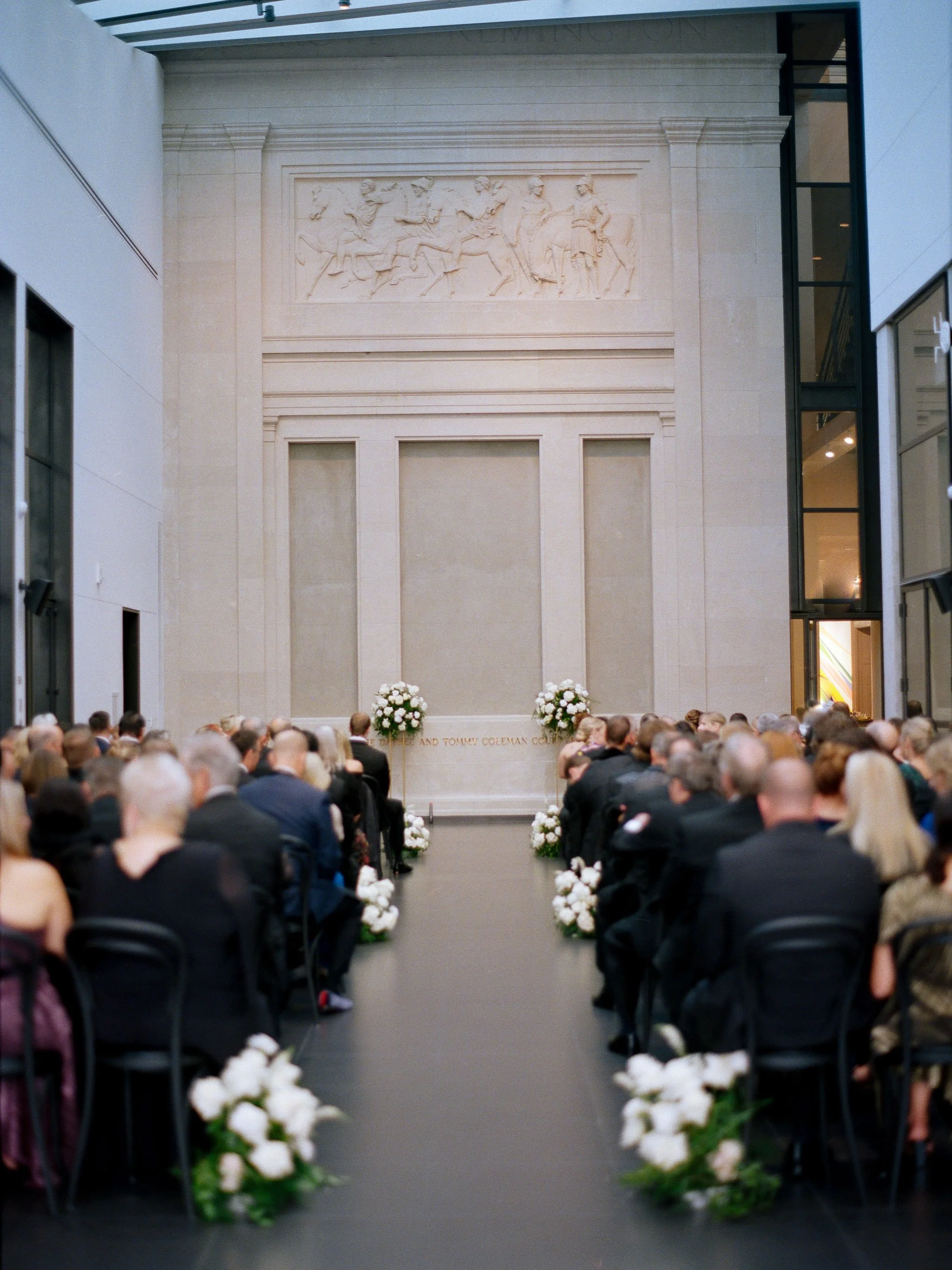 Luxury wedding ceremony inside the New Orleans Museum of Art planned and designed by Everly Event Planning & Design.