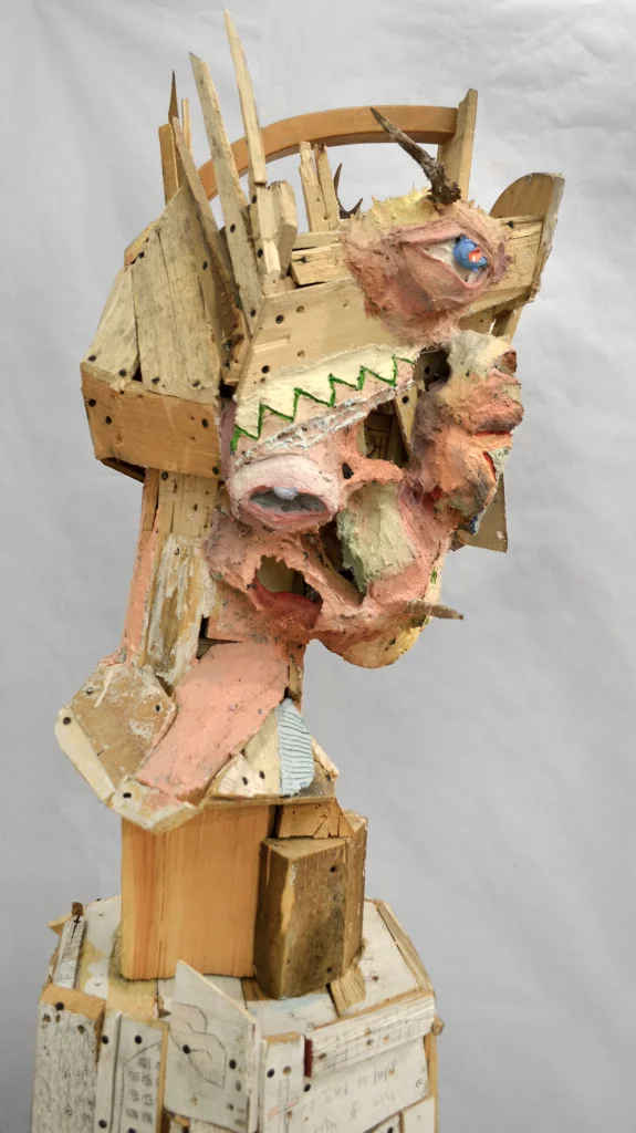 Bust of a Bust , 81 x 22 x 20", reclaimed wood, hardware, polymer gypsum, animal bones, pencil, acrylic, oil, 2013