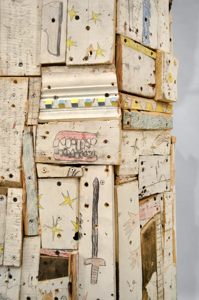 Bust of a Bust , 81 x 22 x 20", reclaimed wood, hardware, polymer gypsum, animal bones, pencil, acrylic, oil, 2013