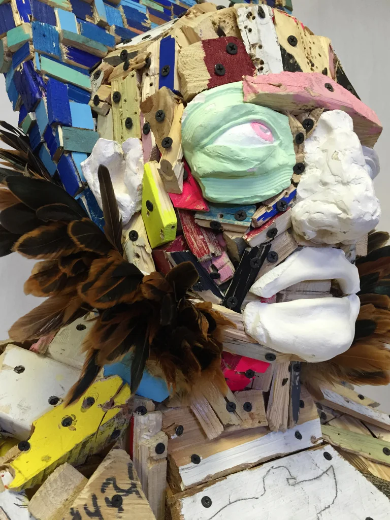 Empire , 36 x 19 x 19", reclaimed wood, plaster, hardware, feathers, paint, 2015