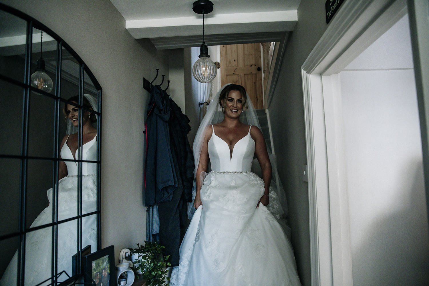 Bride coming down her stairs