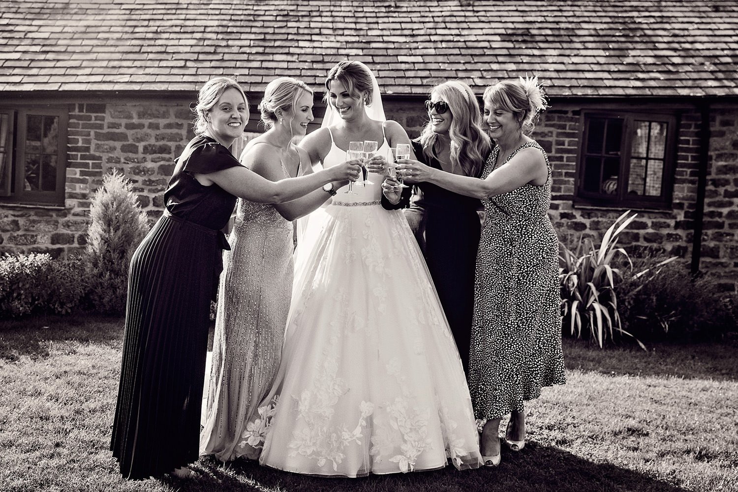 Bride laughing with friends