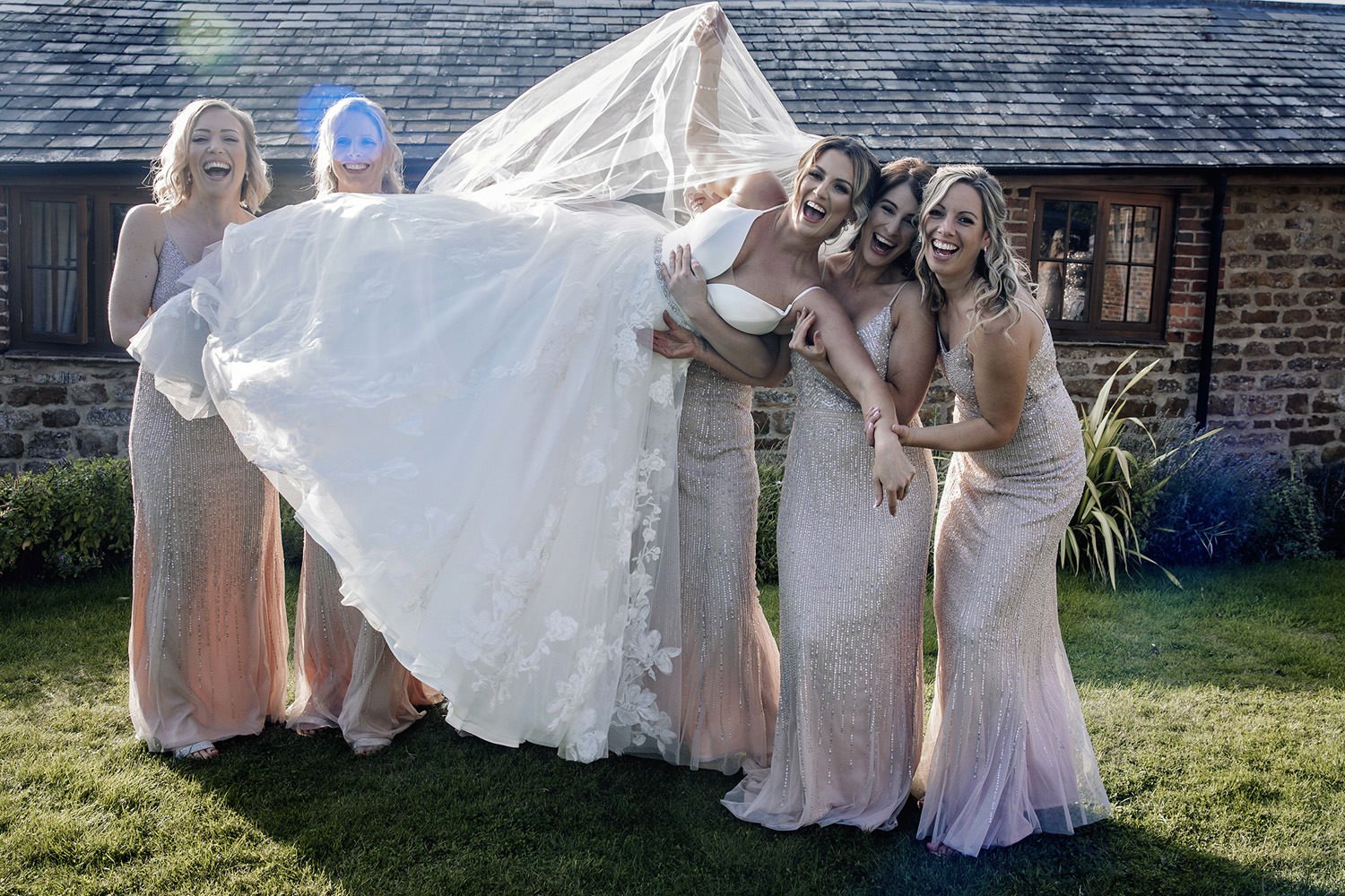 Bride picked up by bridesmaids