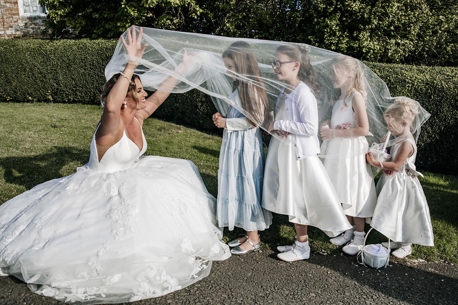 Flower girls under veil