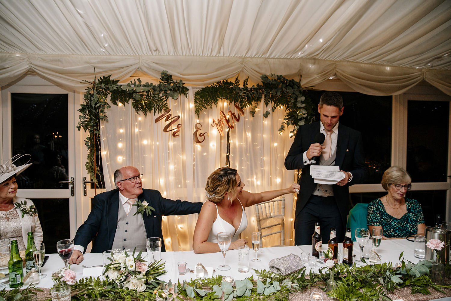 Groom emotional during speech