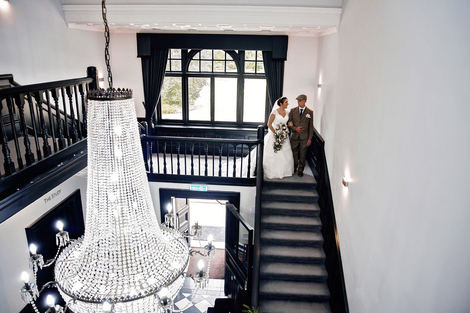 The famous Swynford Manor chandelier and winding staircase