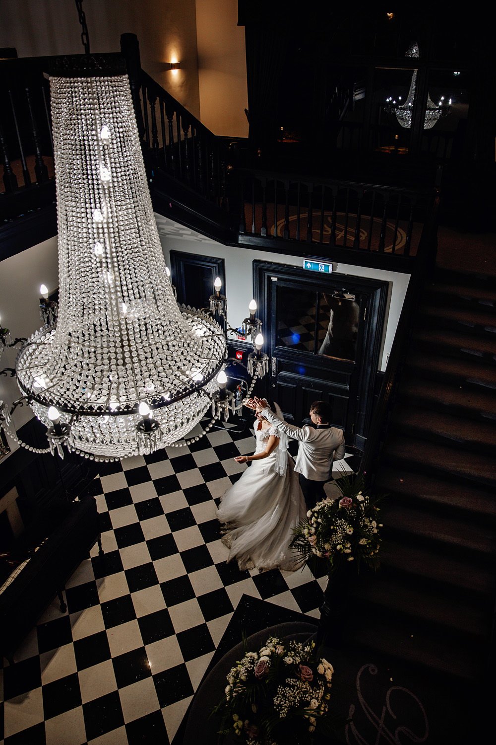 Romantic wedding dance under the chandelier