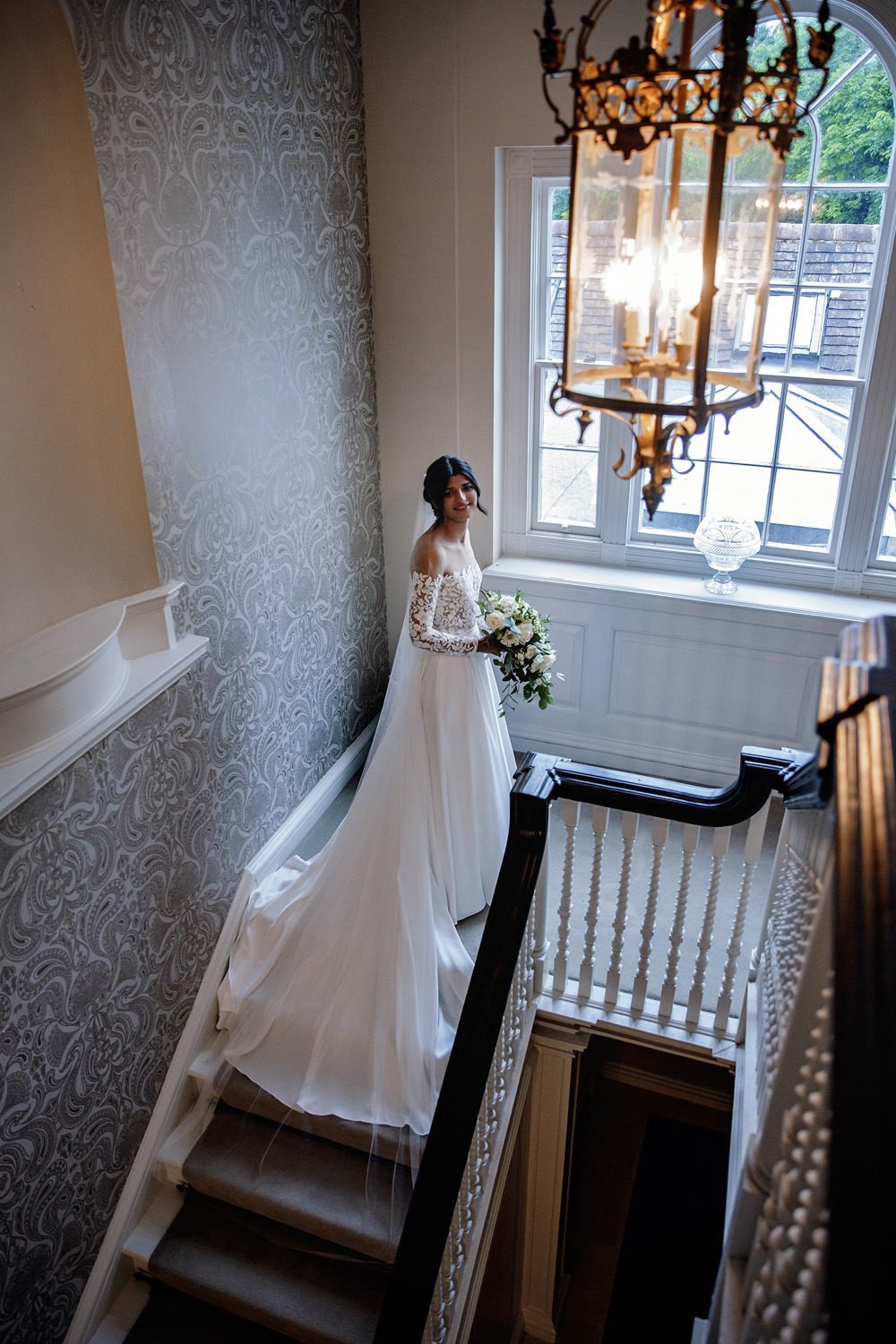 Bride on Barrington Hall staircase