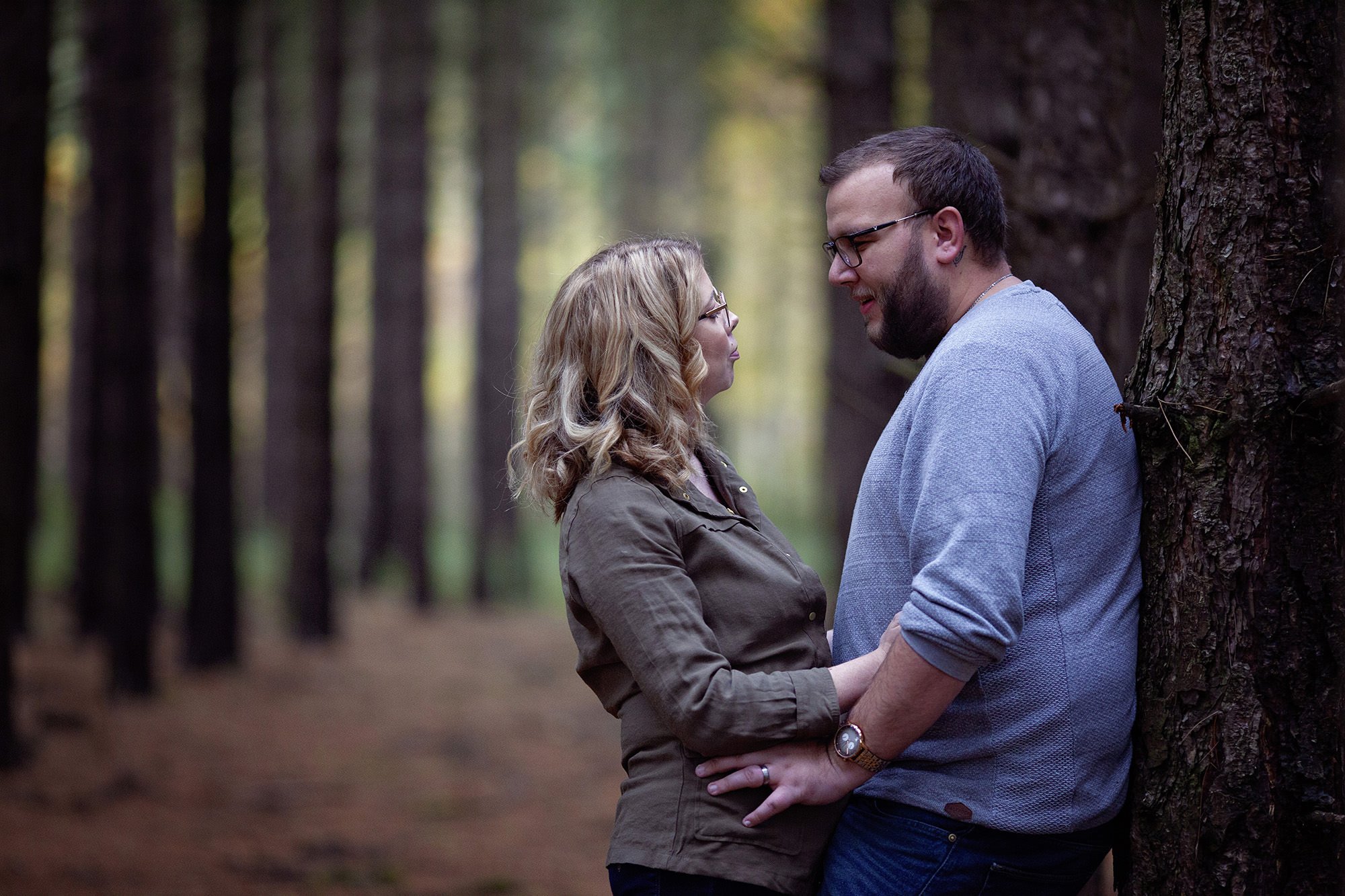 Mum and dad in conifer wood