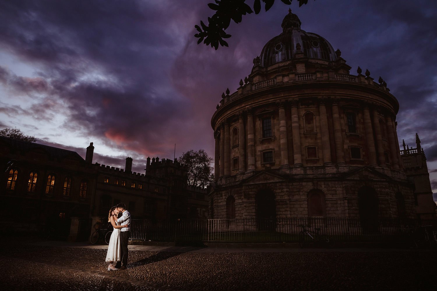 Bride and groom in front of Radcliffe Camera