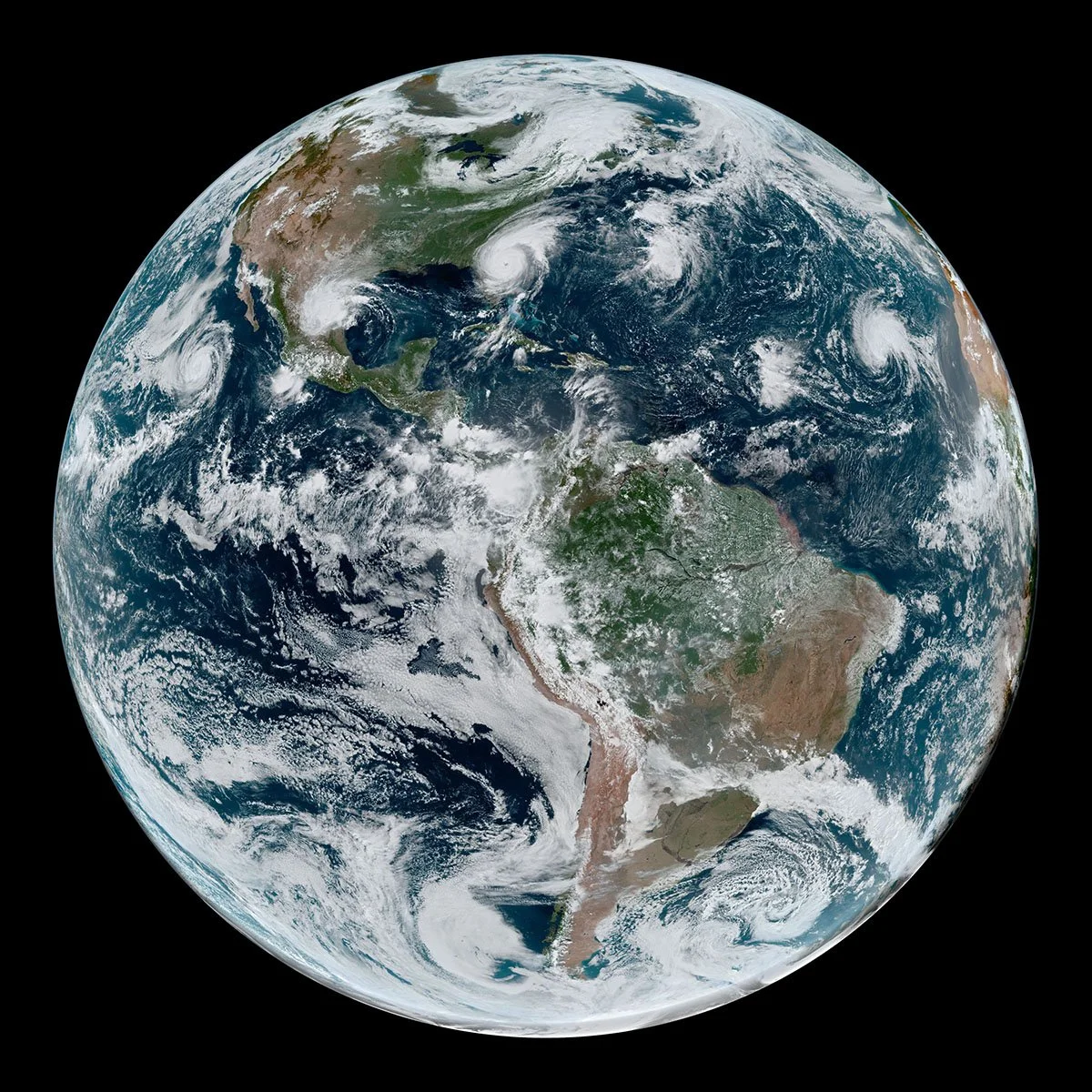 NASA Image of the Earth showing the Western Hemisphere to support the concept of “Expanding Compassion Beyond the Individual Organization” for the Center for Compassionate Leadership blog post, "How To Apply Compassionate Leadership."