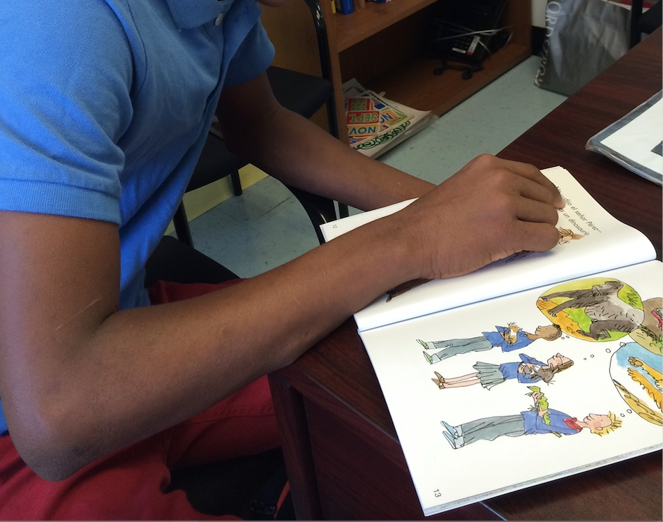 Jose*, reading with our native language specialist, Sarah