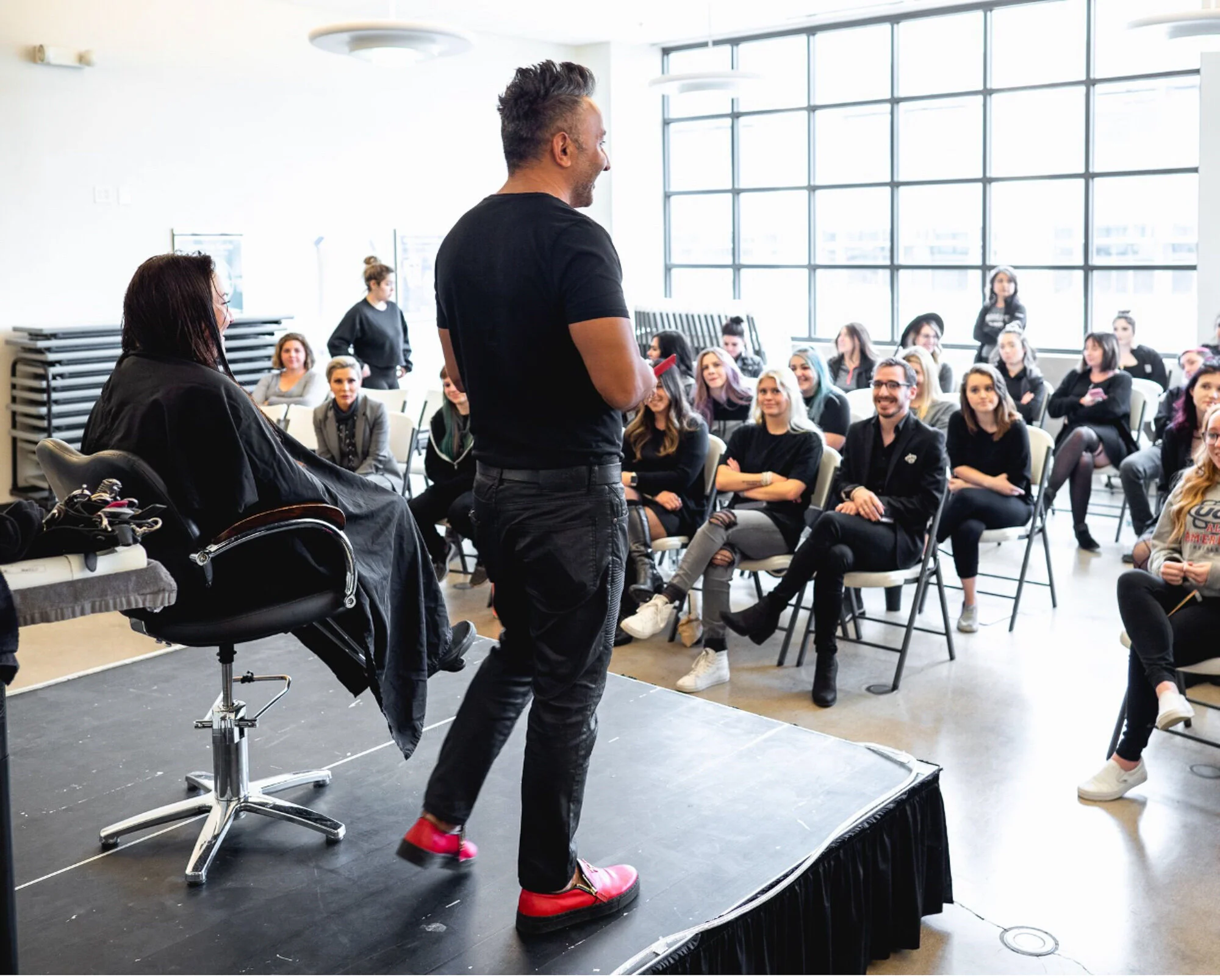 Advanced stylist education led by Ergun Tercan at a European salon in Denver