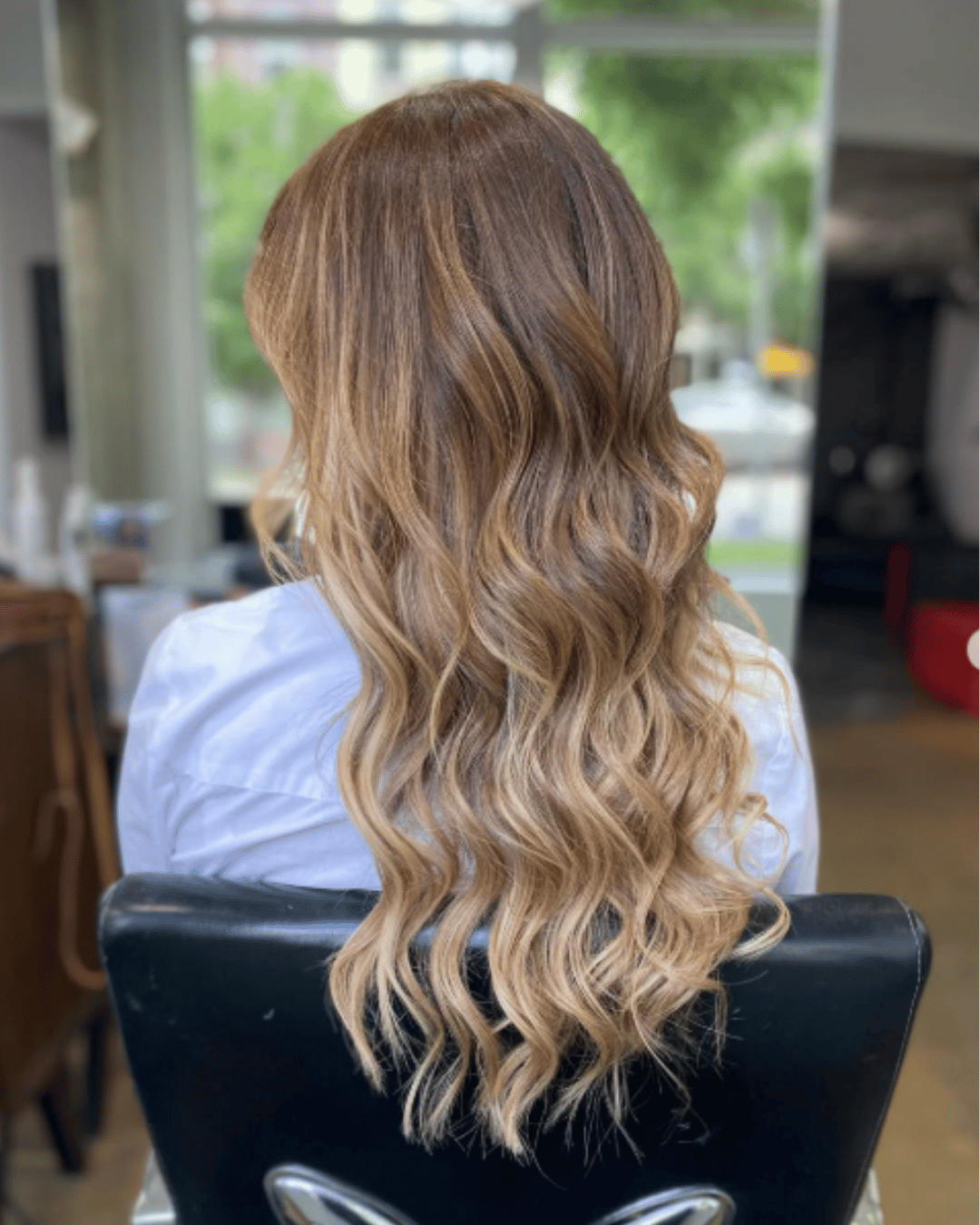 luxury hair highlighting results balayage and babylights done in Ergun Tercan Salon in Denver.