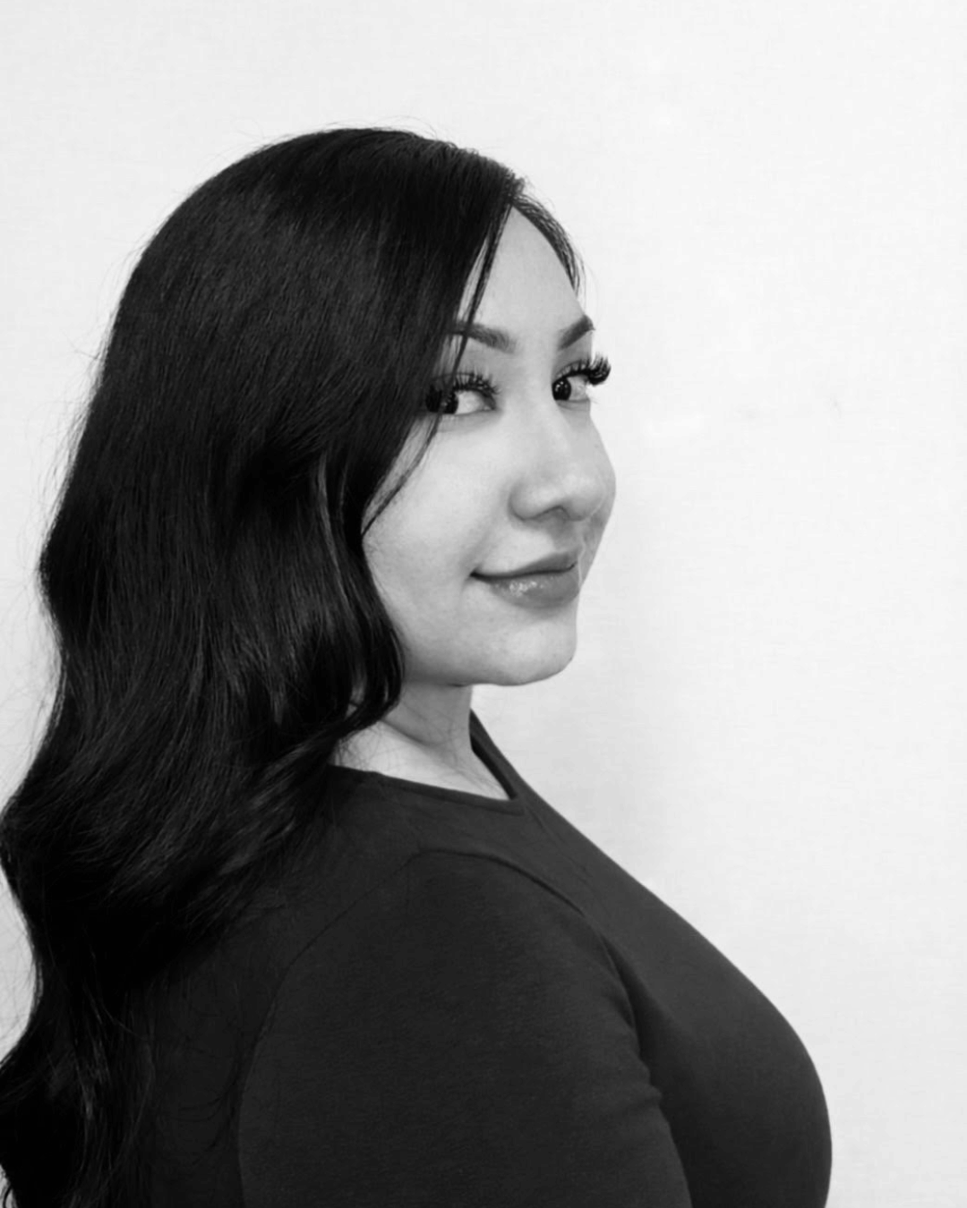 Evelyne Gonzales, , luxury hair stylist at Ergun Tercan European Salon, known for expert hair services in Denver, Colorado