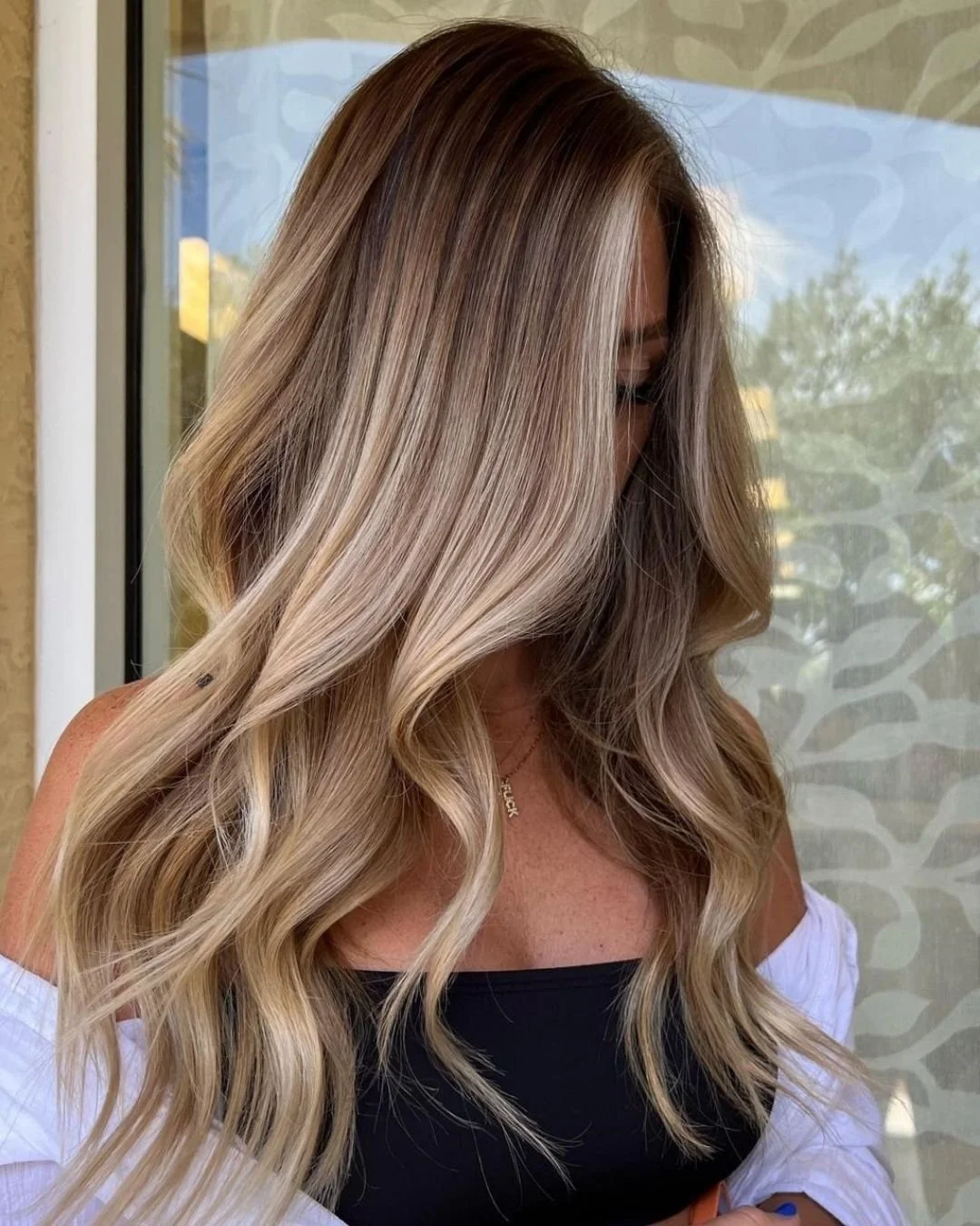 lived in hair color soft balayage natural look