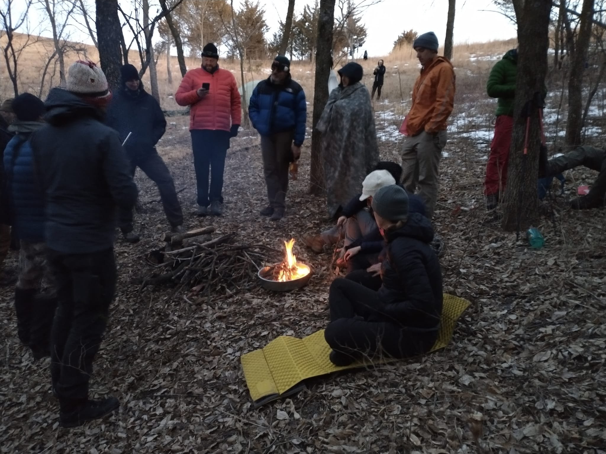 Mountain Travel and Rescue 2023 - Overnight site, gathered around the Campfire.jpg