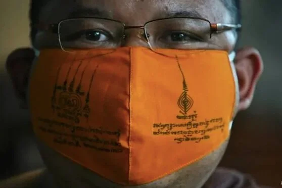 Thai monks at Chak Daeng temple use recycled plastic to make COVID masks