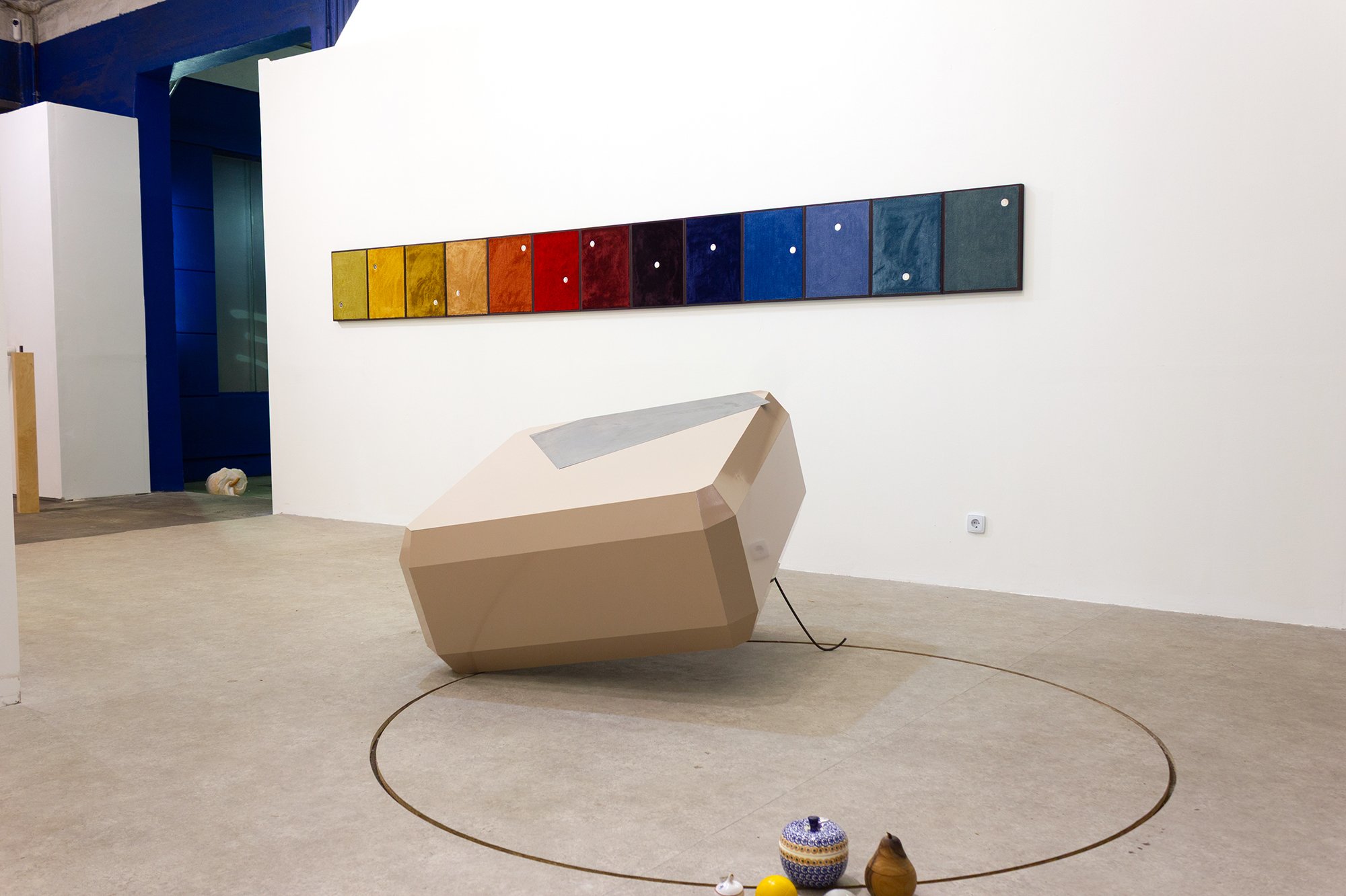 Tears Currency, 2025

stained wooden frames, carpet, custom made coins, Installationview Spoiler Pit-Stop, Berlin