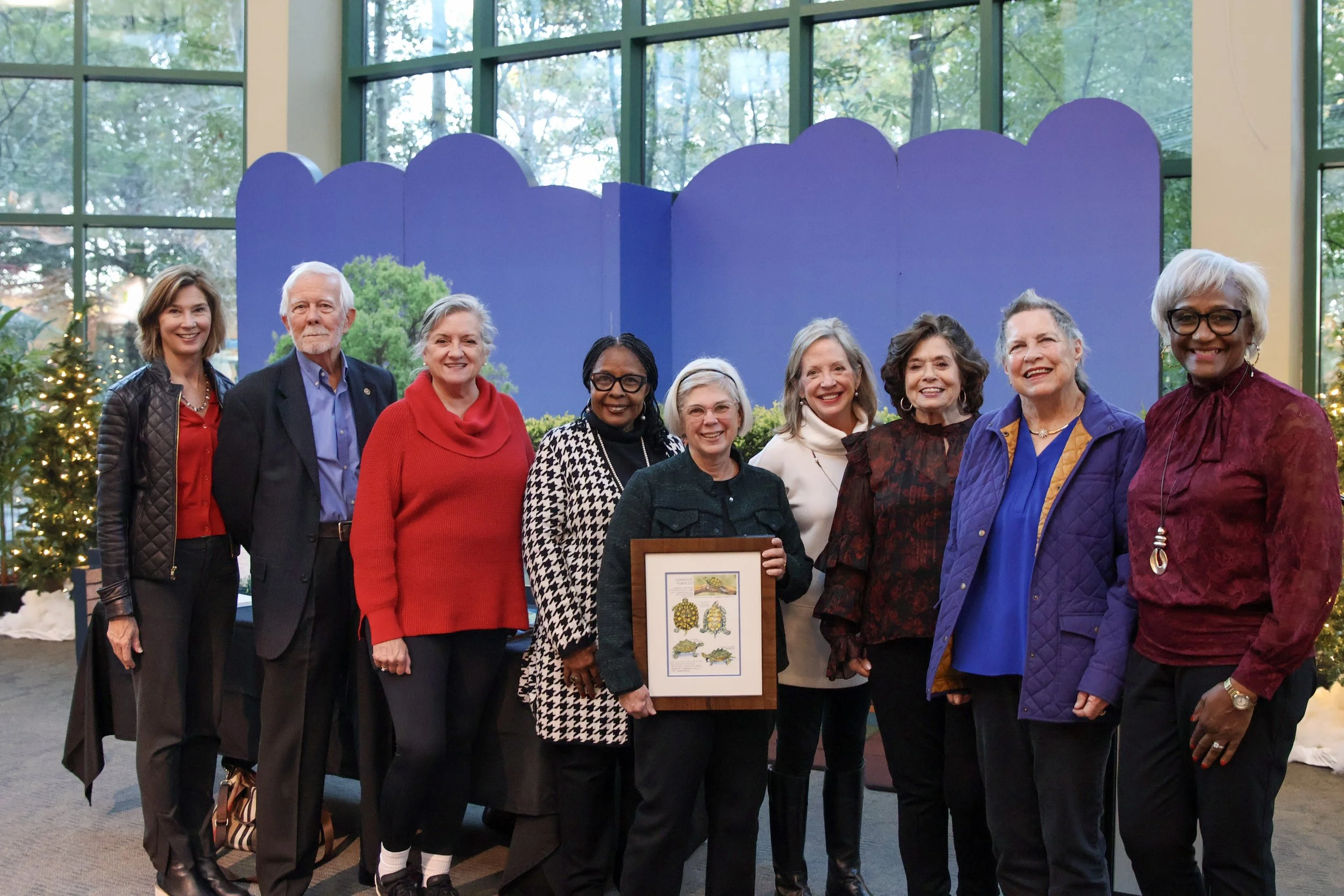 Chris Zachow, center, with current and past board members