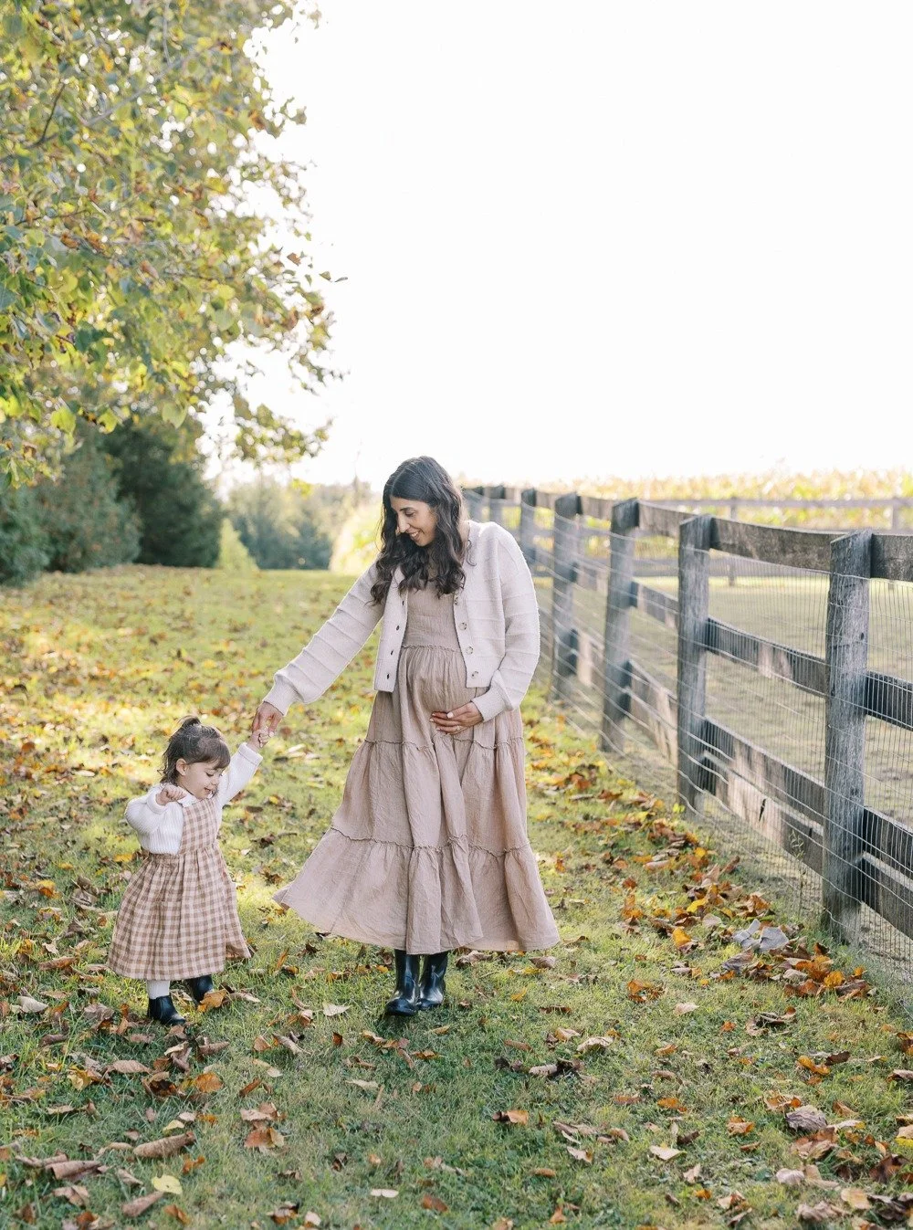 The way the light peeks through the leaves. Fall leaves on the ground. Cool, crisp air that makes your nose run. The joy the farm animals brought. Chasing the sheep so we could get a photo with them. The laughters. A mom and her daughter, present and