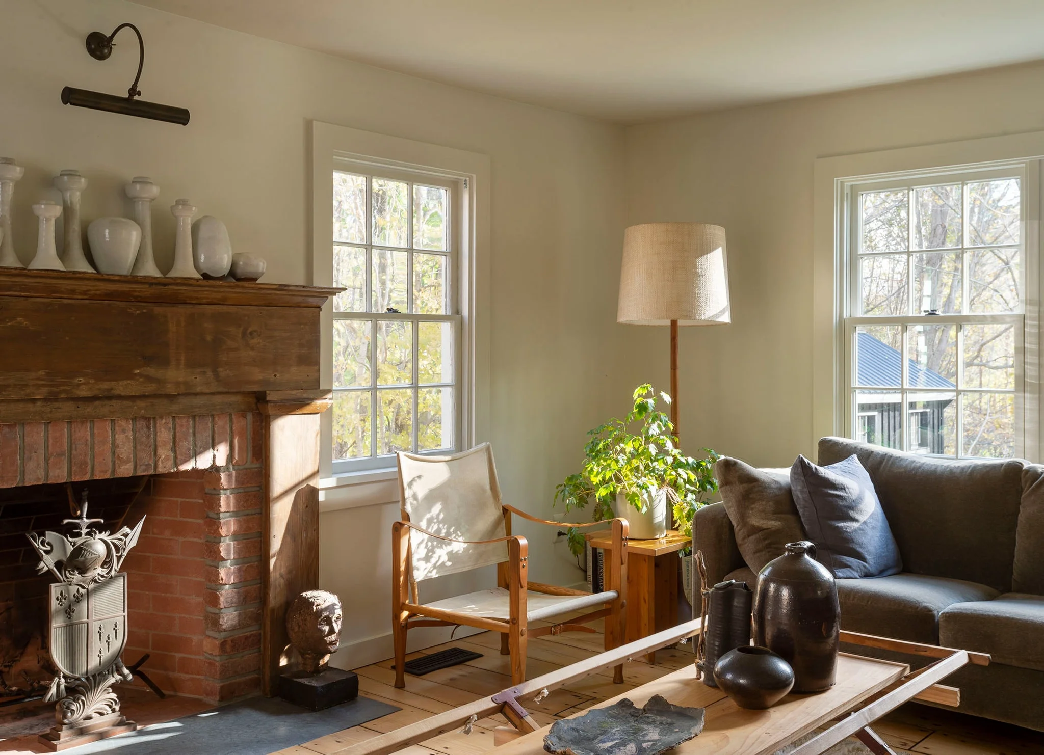 Above image: A beautiful case in point - in the home of the founders of the design firm Workstead, they artfully show us how it’s done with all five of my key styling tips: edit, group, balance, something old - something new, & greenery. Image via T Magazine . Top image: Our client’s custom mantle was balanced by a pair of brass sconces and styled with grouped sculptural pieces, vintage abstract art, and a bundle of fresh greenery for a polished yet edited look. Photographed by Elijah Hoffman .