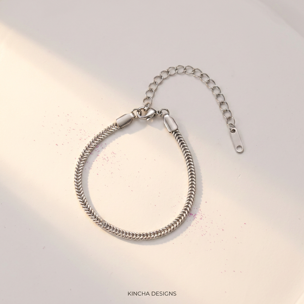 Silver foxtail chain bracelet on white surface - stainless steel jewellery London - Kincha Designs